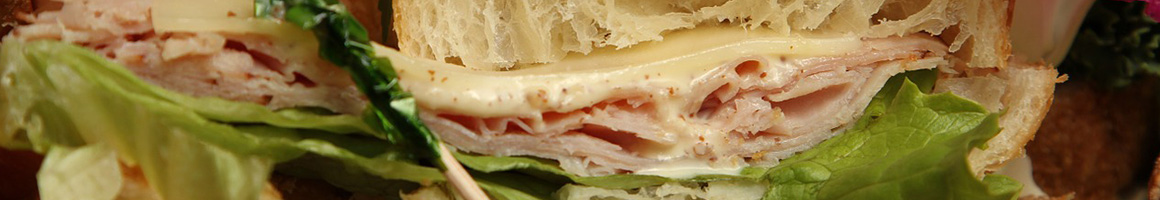 Eating Sandwich Salad at Aloha Salads restaurant in Kailua, HI.